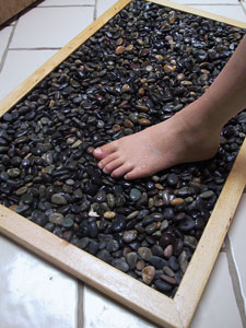 Try This: Projects for the Bathroom: Bath Mat With Stones Image